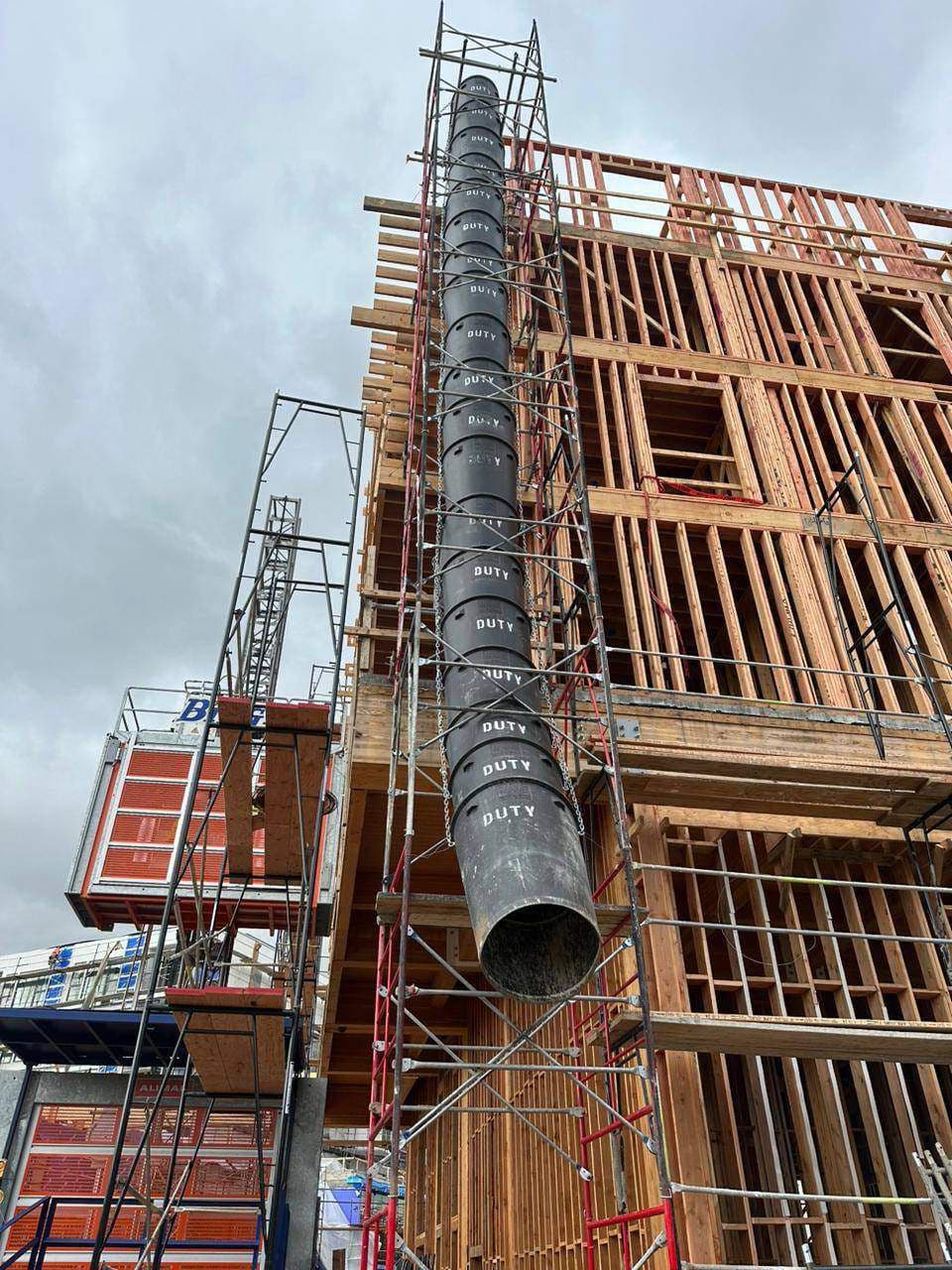 Reliable Trash Chute Systems scaffolding project 1 by Duty Scaffold Inc.