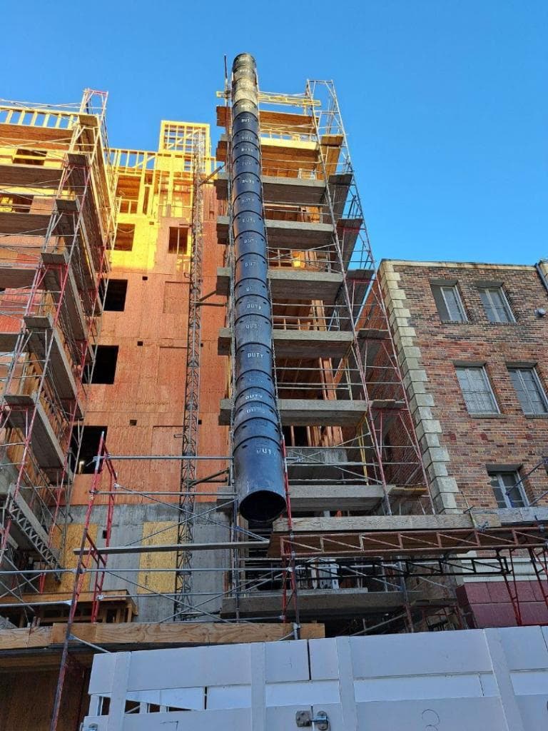 Reliable Trash Chute Systems scaffolding project 4 by Duty Scaffold Inc.